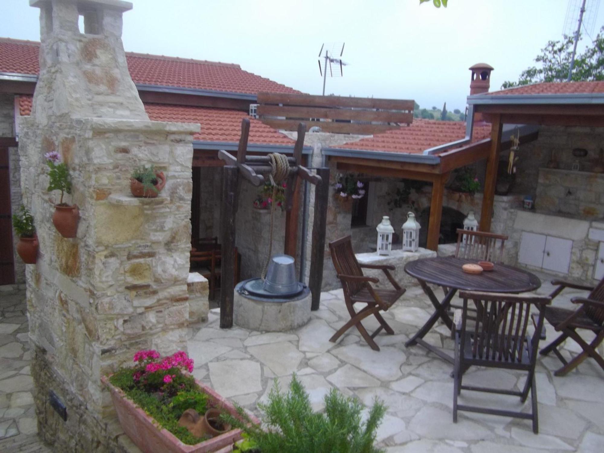 Xenios Cottages Lofou Quarto foto