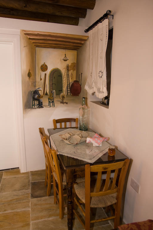 Xenios Cottages Lofou Quarto foto